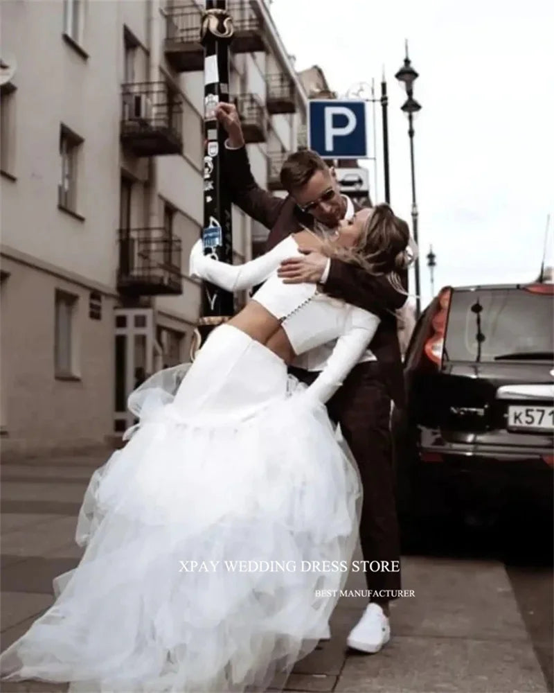 Princess-style wedding dress, long sleeve white gown with voluminous tulle skirt – bridal couture, wedding dress store