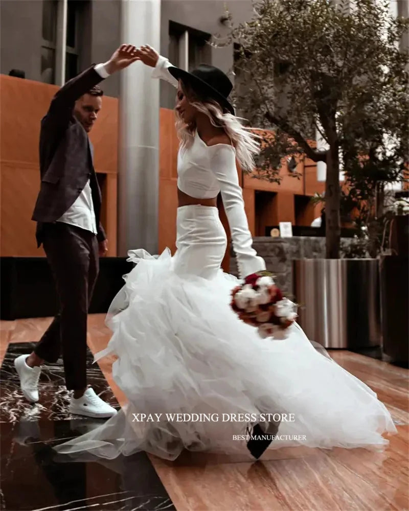 Princess-style wedding dress, long sleeve white gown with voluminous tulle skirt – bridal couture, wedding dress store