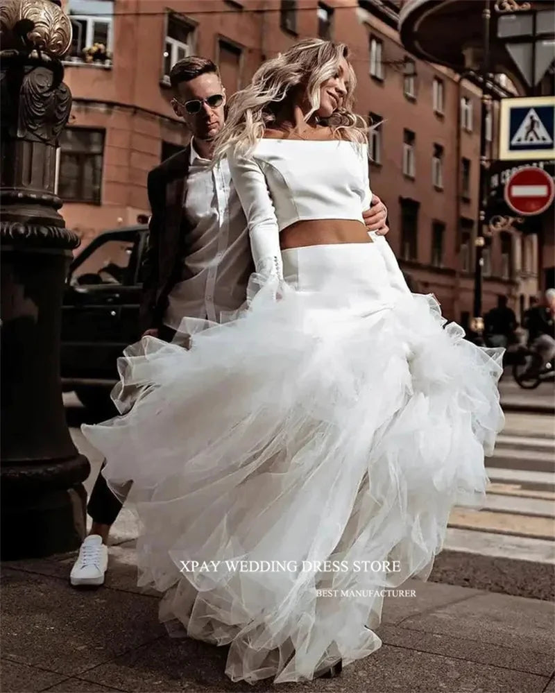 Princess-style wedding dress, long sleeve white gown with voluminous tulle skirt – bridal couture, wedding dress store